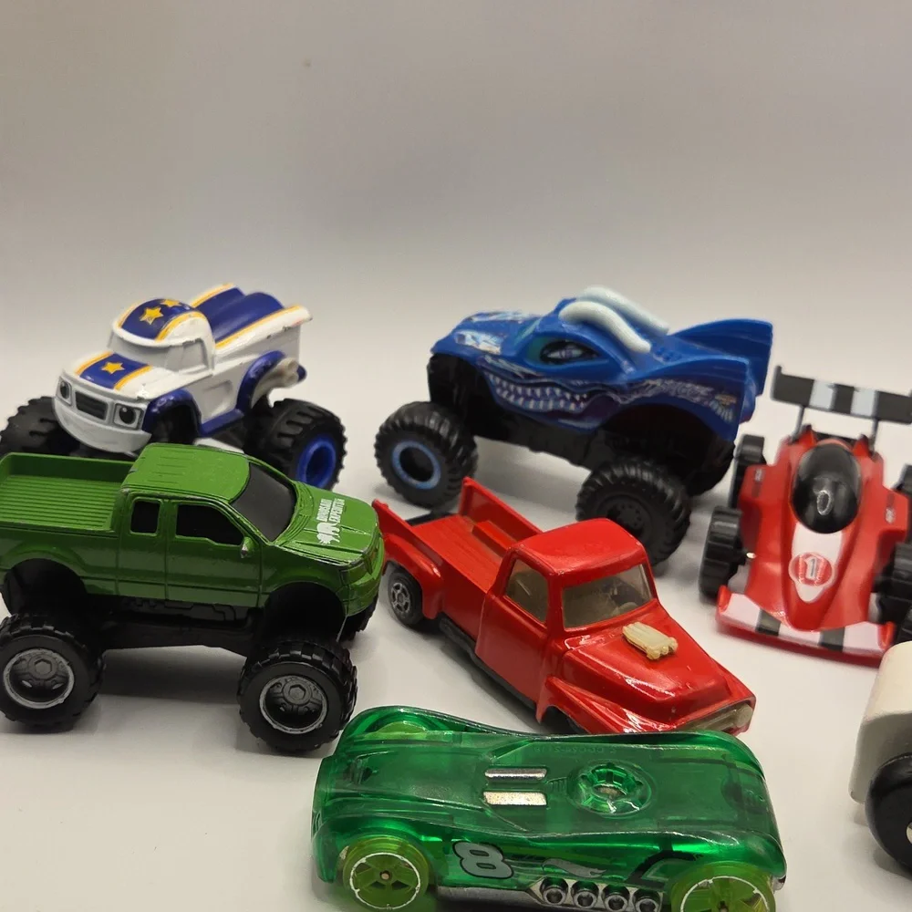 Die Cast. And Plastic Cars And Trucks